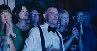 wedding guests watching a drag performance
