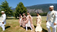 wedding party walking with indian bride at riverlands in pemberton