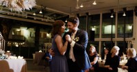 groom dancing with mother during wedding reception