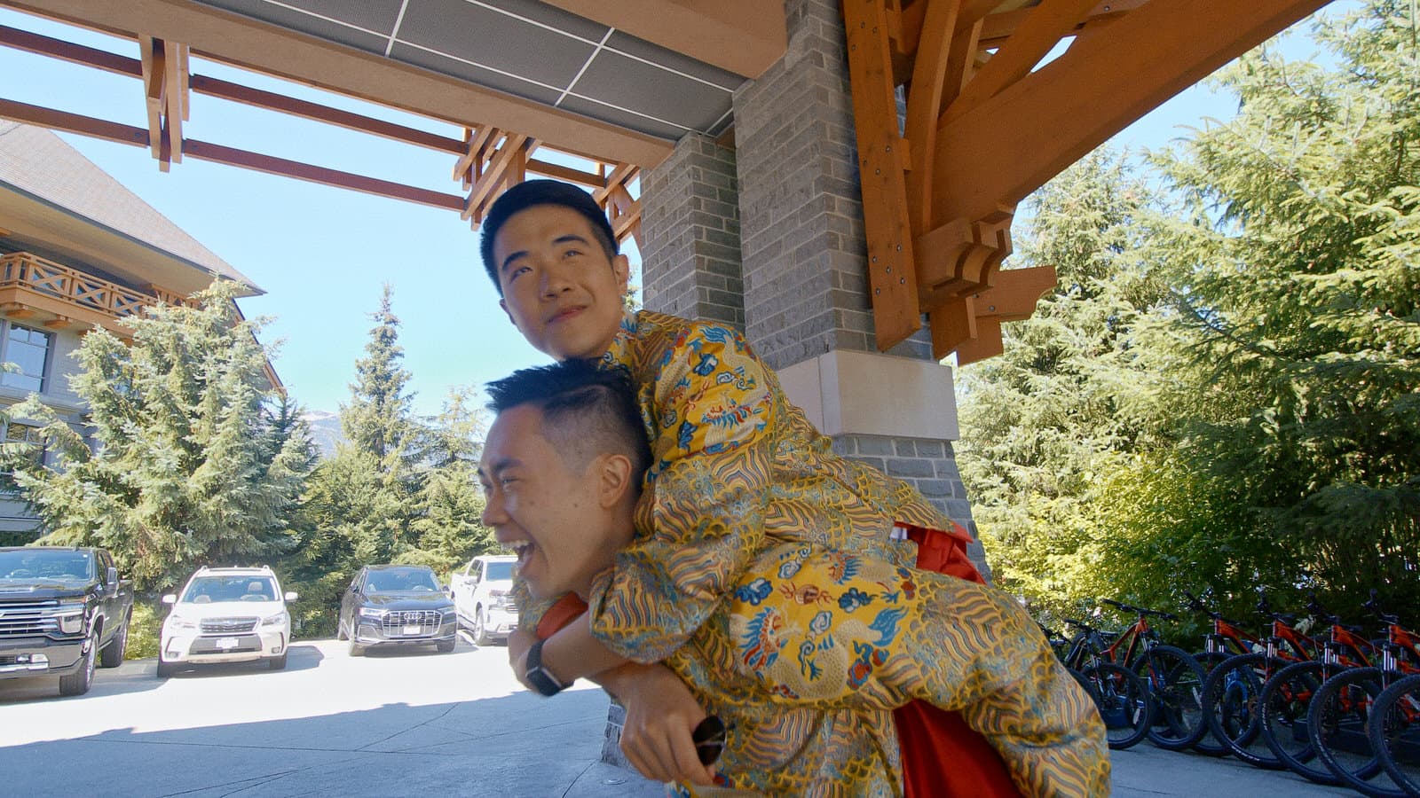 chinese grooms wearing traditional gold tang suits