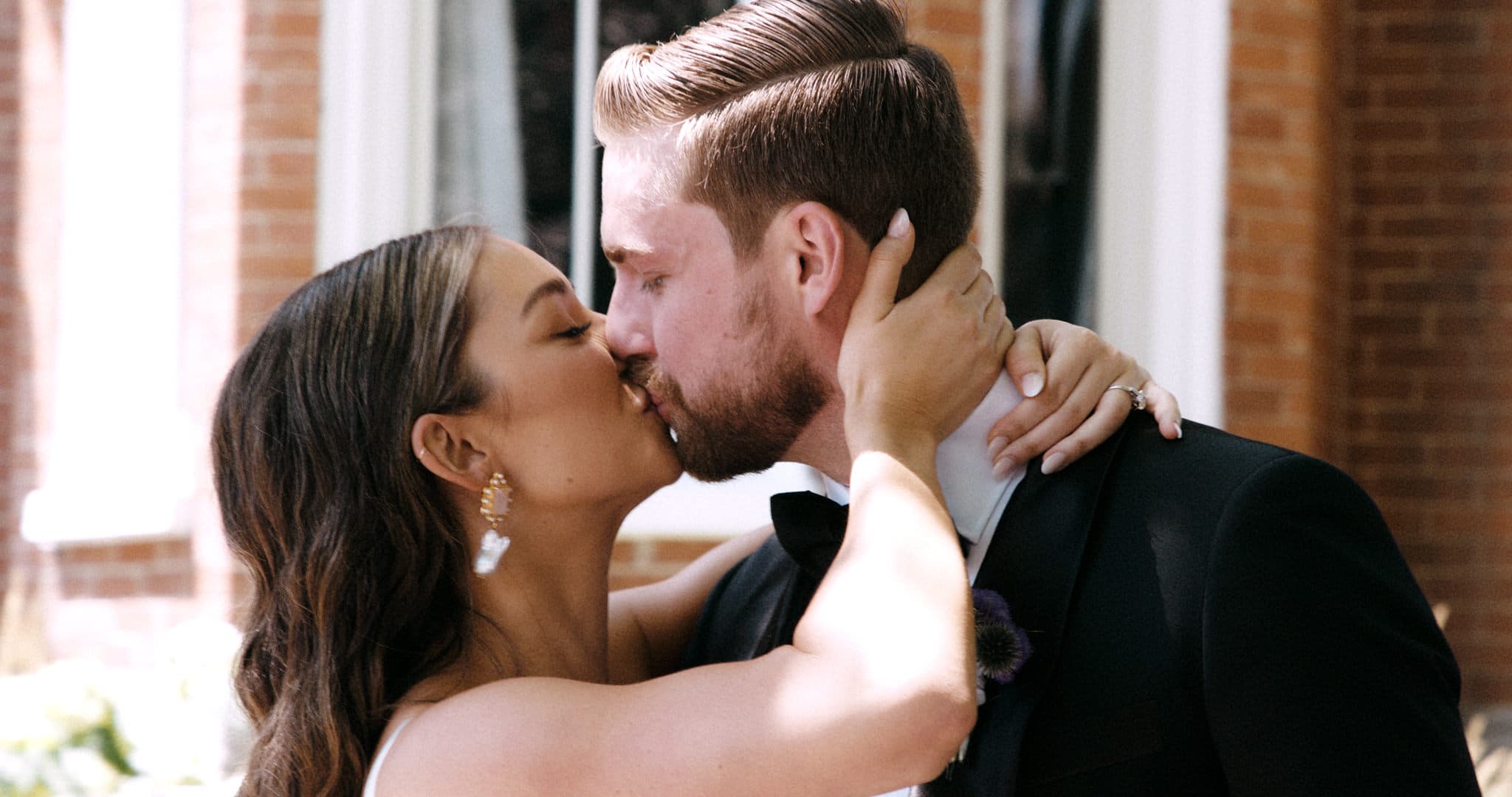 bride and groom kissing
