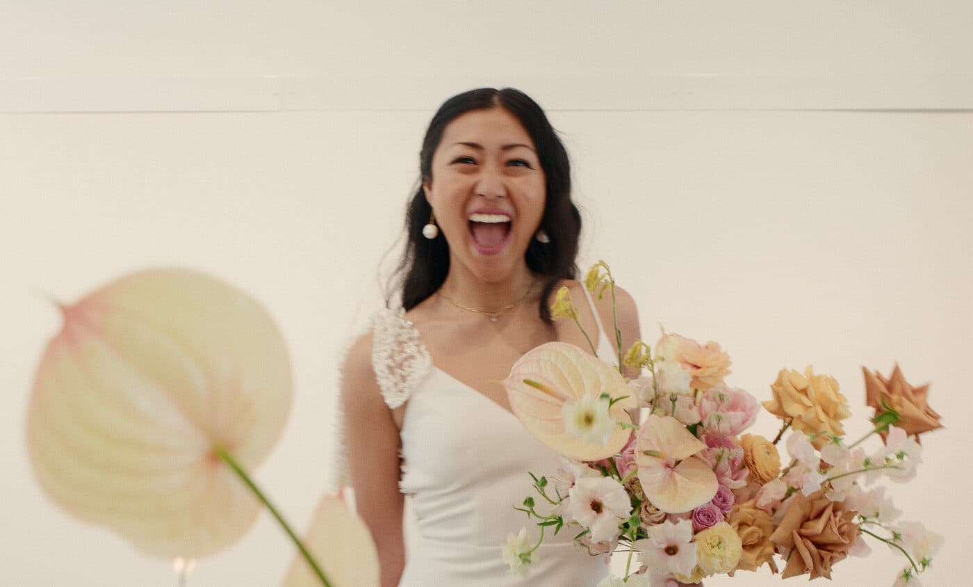 asian bride excited about wedding decor