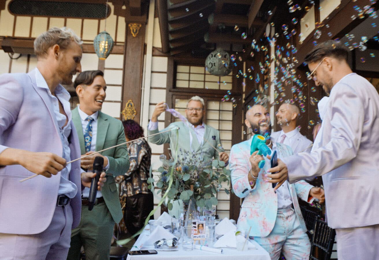 wedding guests enjoying bubble guns at a wedding in LA