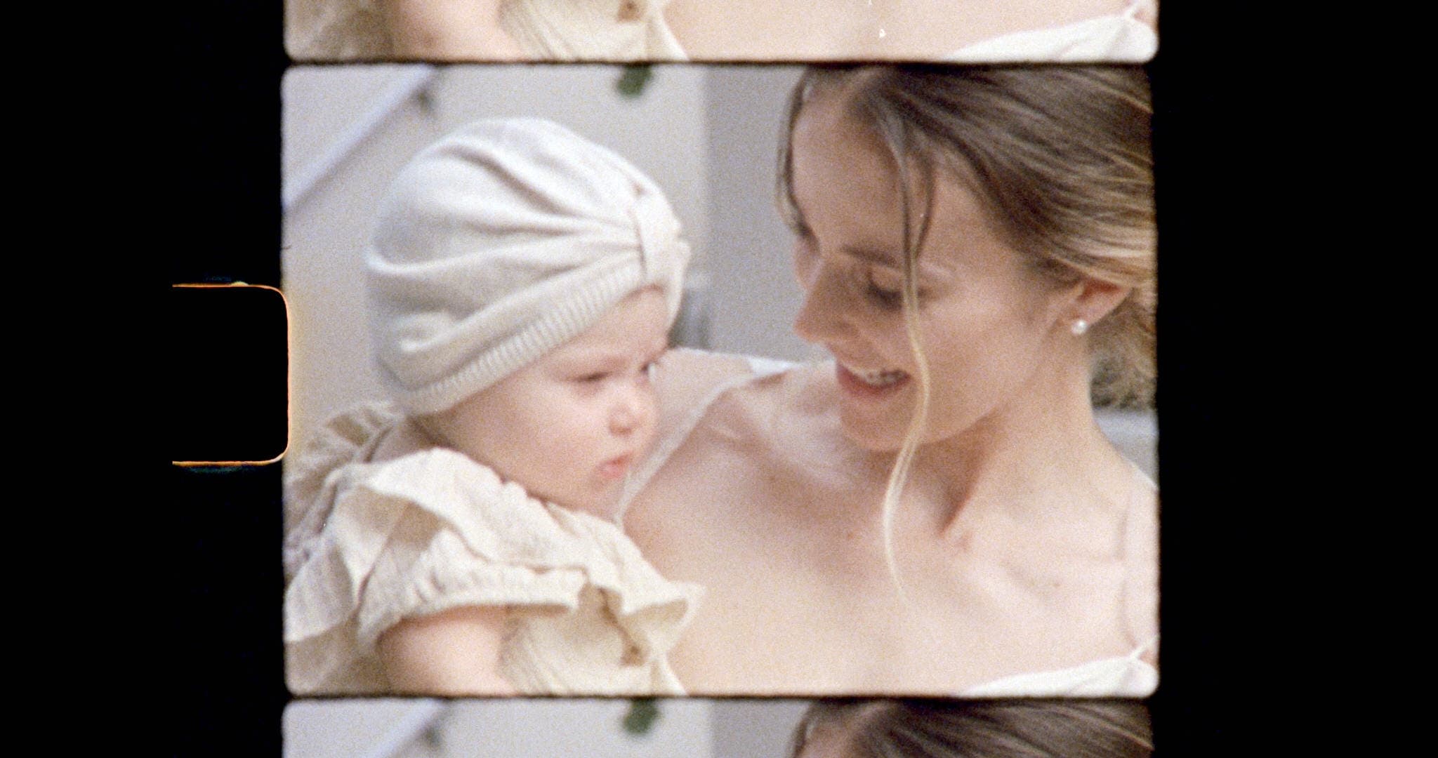 super 8mm film still of bride and baby