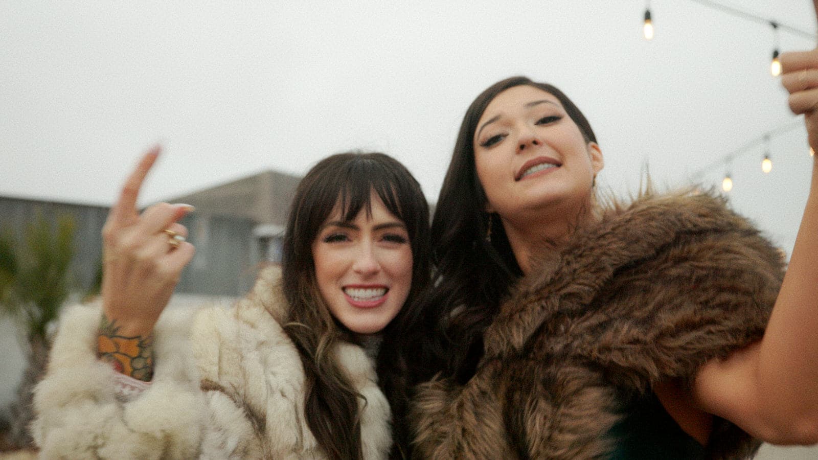 bride and bridesmaid dancing at camino real ranch